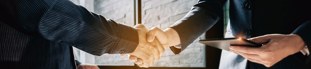 businessmen talking about shareholders agreement