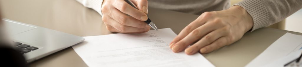 businesswoman signing a legal contracts