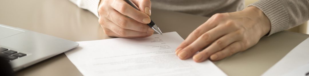 businesswoman signing a legal contracts